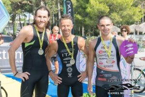 Il podio maschile dell'Aquaticrunner Grado - Lignano 2017: (da sinistra) Faris Al-Sultan, Massimo Guadagni e Francesco Cauz (Foto ©Aquaticrunner / Daniel Miot photographer)