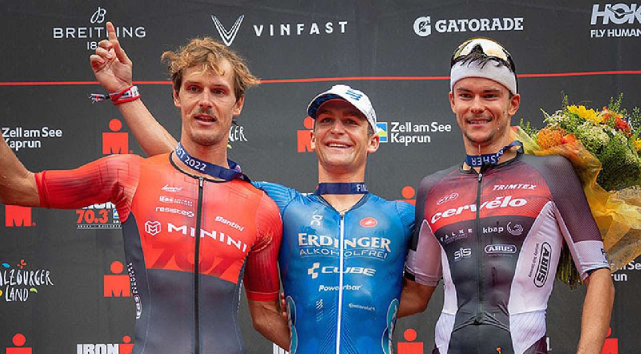 Il podio dell'Ironman 70.3 Zell am See 2022: vince Frederic Funk, secondo l'italiano Gregory Barnaby (a sinistra nella foto)
